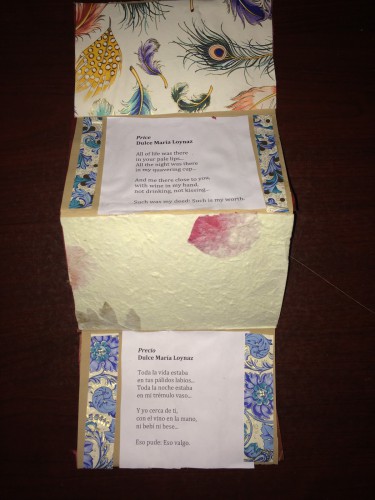 Handmade accordion artists' book with poem by Dulce Maria Loynaz in English and Spanish.