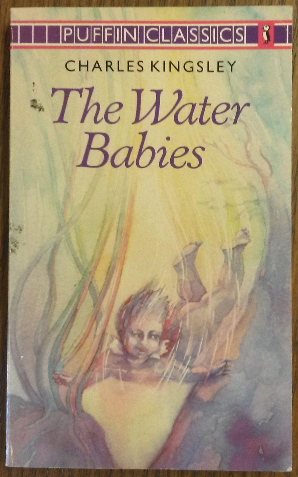 Cover image of water baby swimming amidst seaweed