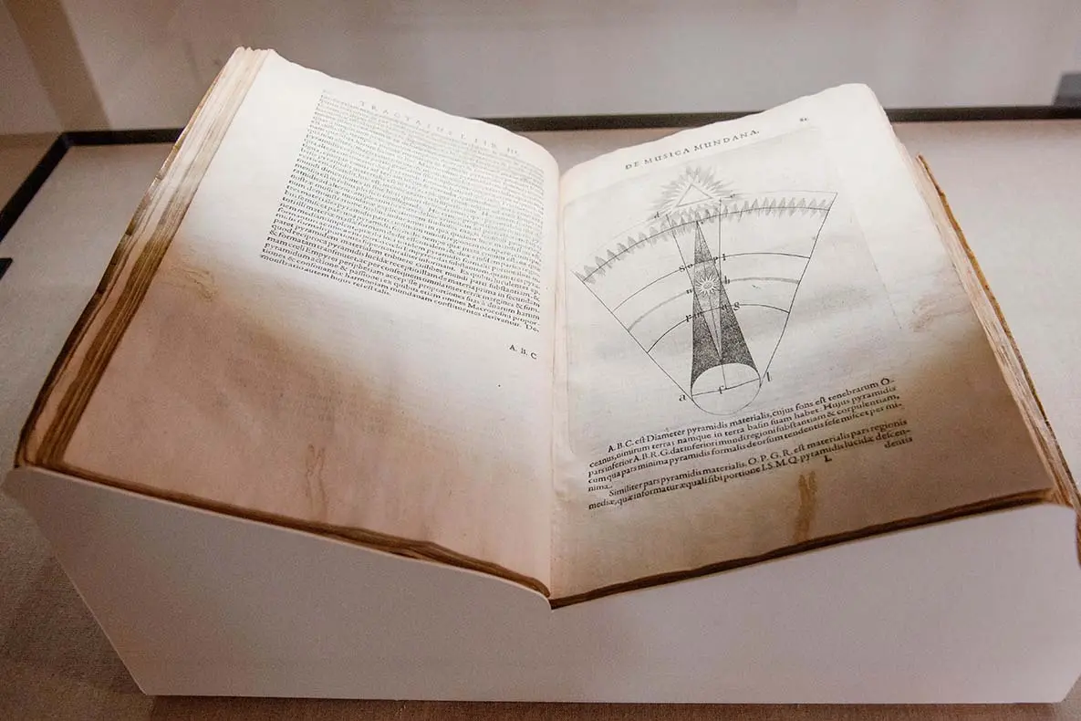 Open book on display in the Special Collections Exhibit Space