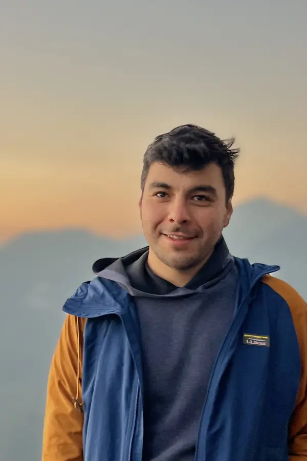 Very well lit photo of Jesus in front of scenic volcano background in Guatemala