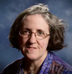 PF Anderson's Photo, an older white woman with gray and brown hair wearing glasses