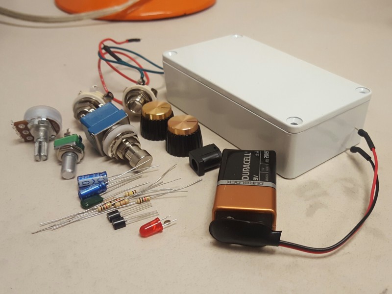 A metal enclosure and various electrical components.