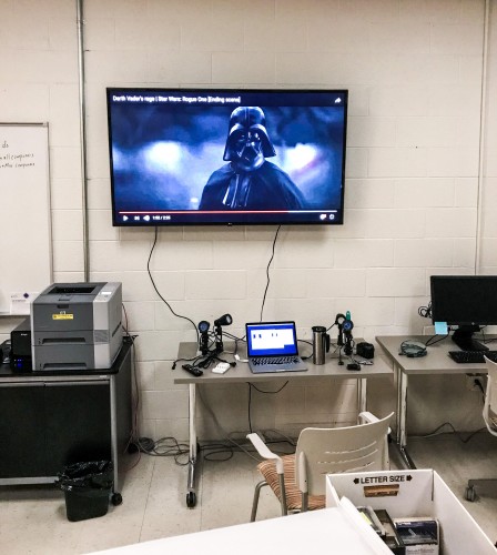 Large monitor with a Darth Vader clip playing