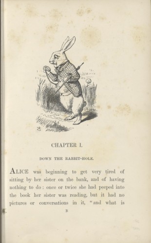 The first page of the 1865 edition of Alice's Adventures in Wonderland, showing a picture of the white rabbit and the first few sentences of the story. 