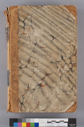 Exterior of volume 1, with boards covered in marbled paper and leather flaking from the spine. 