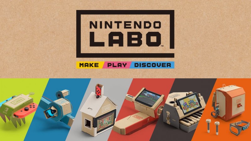 The top half of the image has a brown background with text in the middle. The words “ Nintendo Labo” are written in large black text, outlined with a thick black that forms a square except for a missing piece in the bottom right corner. Underneath, the words “make”, “play”, and “discover” are written in smaller black text on yellow, pink, and blue backgrounds, respectively. The bottom half of the image showcases several objects made from cardboard that are meant to be a green RC CAR, a blue fishing rod, a white house, a red motorcycle, a black piano, and an orange backpack