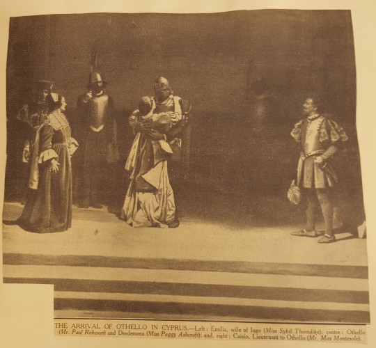 Group shot on stage of Desdemona greeting Othello