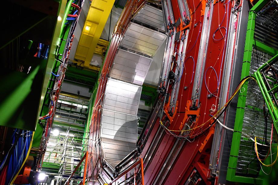 Close up of the center of the collider with lots of colorful metal and wires.