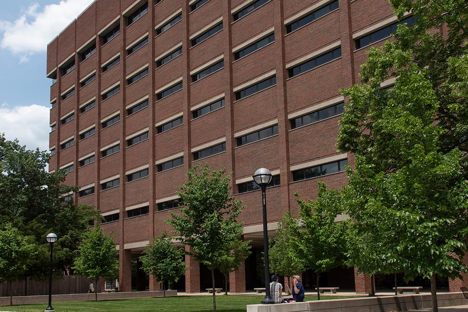 Exterior of the Hatcher South building — eight stories of red brick with windows along each floor.