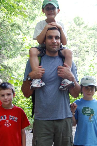 Craig on a hike with his children and nephew