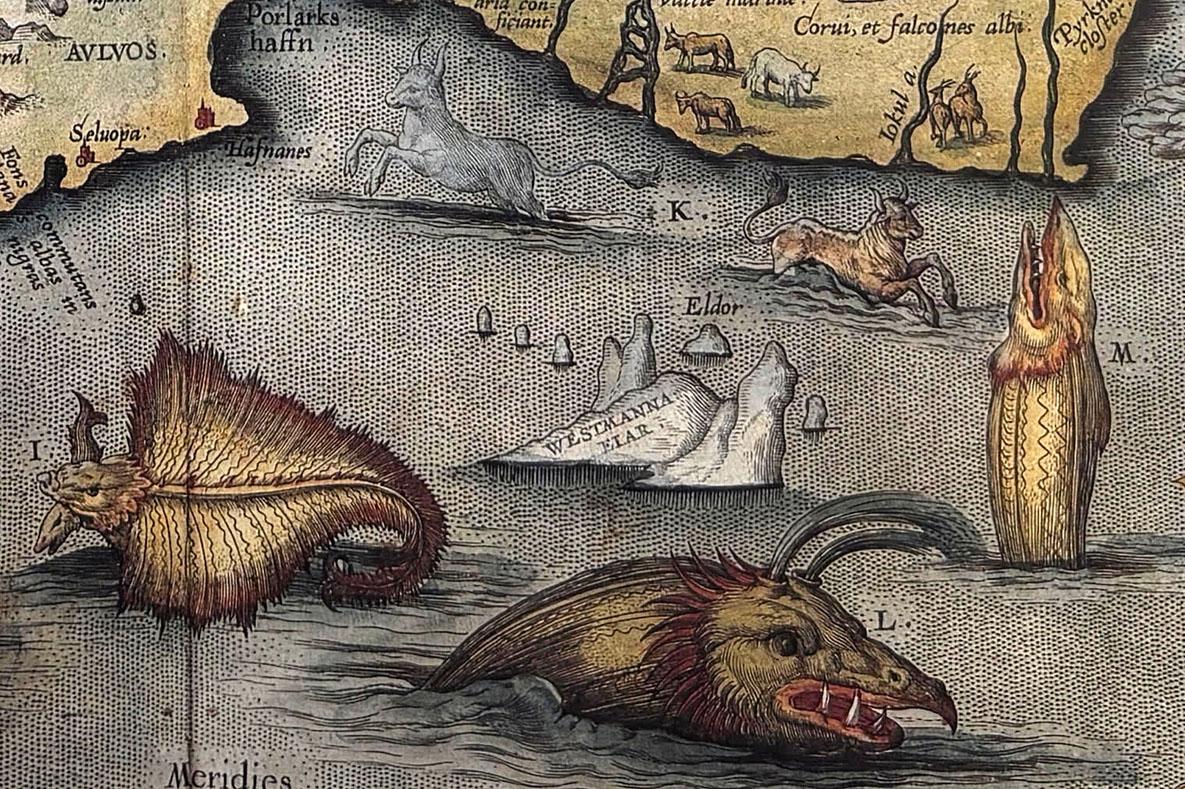 Map showing fantastical sea creatures in the ocean.