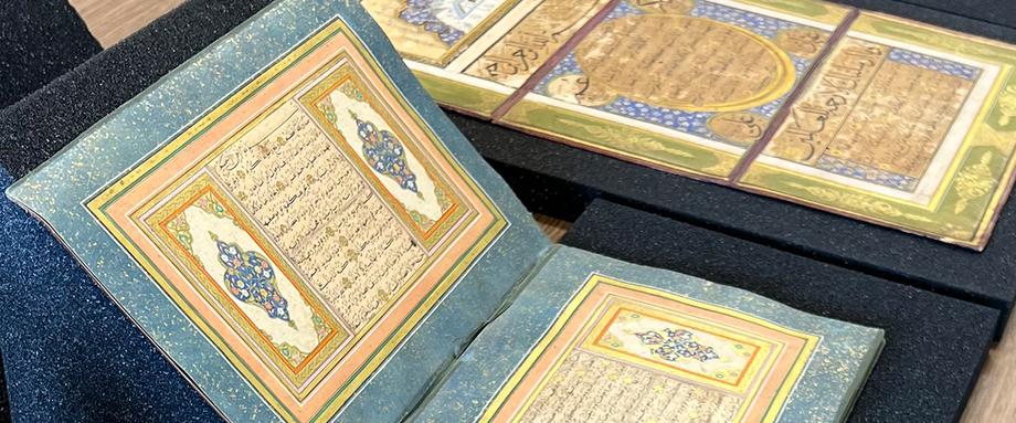 Decorated volumes open on a table