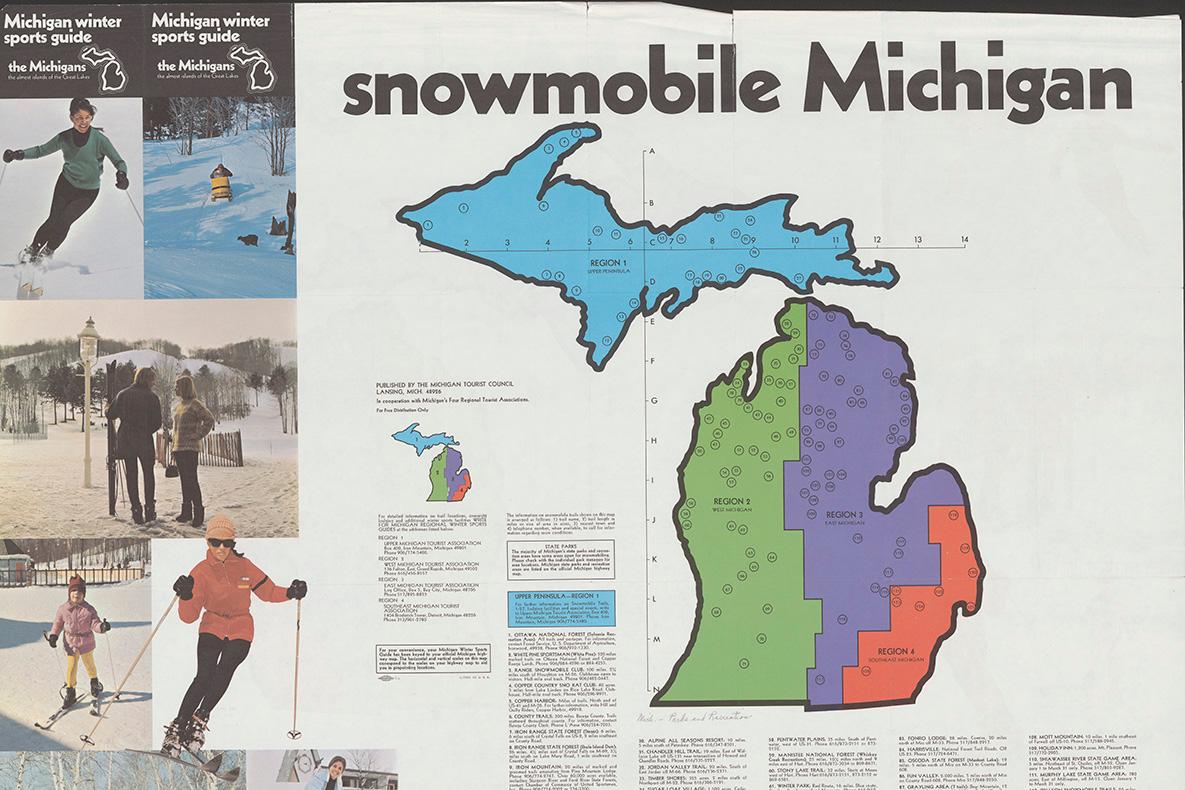 Map of Michigan that says "Snowmobile Michigan" and shows skiers along the side.