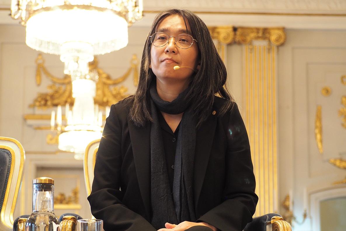 Woman wearing black.