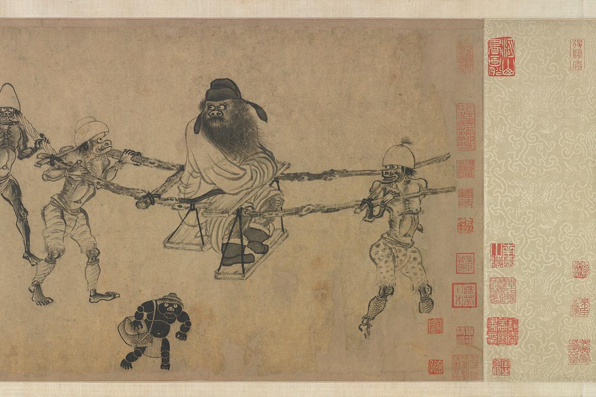 Large, imposing man being carried on a litter by two assistants.